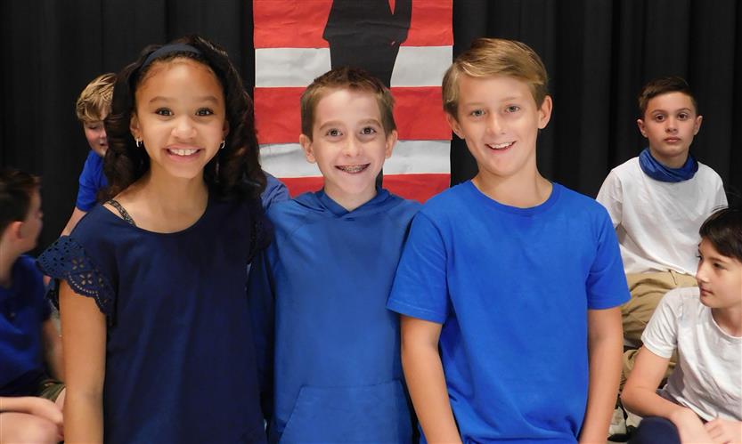 Students sing in Veterans Day performance